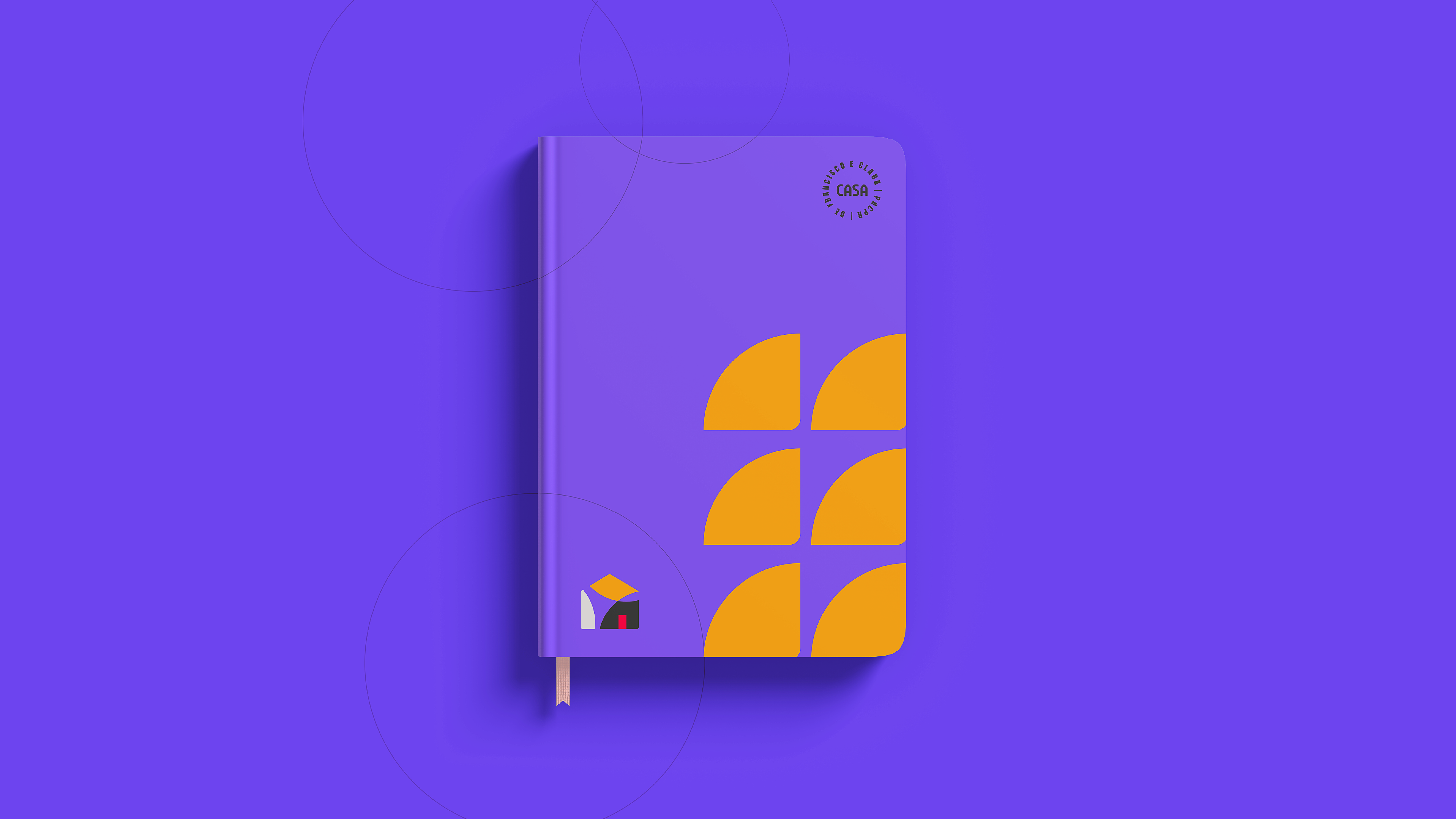 Caderno com a identidade visual da Casa de Francisco e Clara